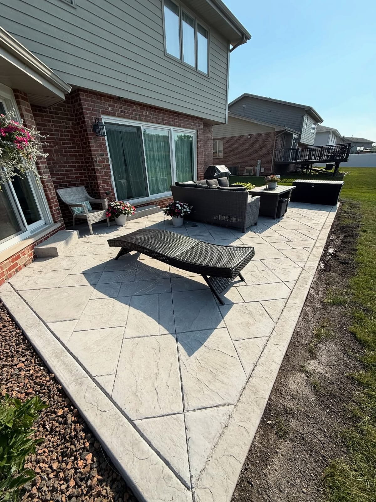 Stamped concrete backyard space